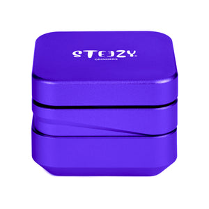 STEEZY® 4+1 | High-End Grinder | 63mm | 4-Piece Herb Grinder | Square | CNC-machined aluminum alloy | Neodymium magnetic closure | Includes brush & "Ultra Purple" tapping band