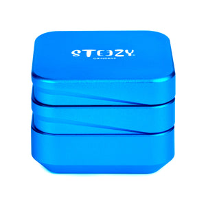 STEEZY® 4+1 | High-Class Grinder | 63mm | 4-piece herb grinder | Square | CNC-machined aluminum alloy | Neodymium magnetic closure | Includes brush & tapping band "Electric Blue"