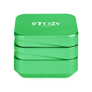 STEEZY® 4+1 | High-End Grinder | 63mm | 4-Piece Herb Grinder | Square | CNC-machined aluminum alloy | Neodymium magnetic closure | Includes brush & tapping band "Summer Green"