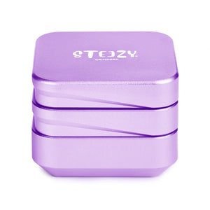 STEEZY® 4+1 | High-Class Grinder | 63mm | 4-piece herb grinder | Square | CNC-machined aluminum alloy | Neodymium magnetic closure | Includes brush & tapping band "Purple Rose"