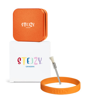 STEEZY® Pocket | High-Class Grinder | 55mm | 2-piece herb grinder | square | CNC-machined aluminum alloy | Neodymium magnetic closure | Includes brush & tapping band "Blazing Orange"